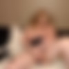 Chubby blonde with BIIIG tits plays with a dildo thumb